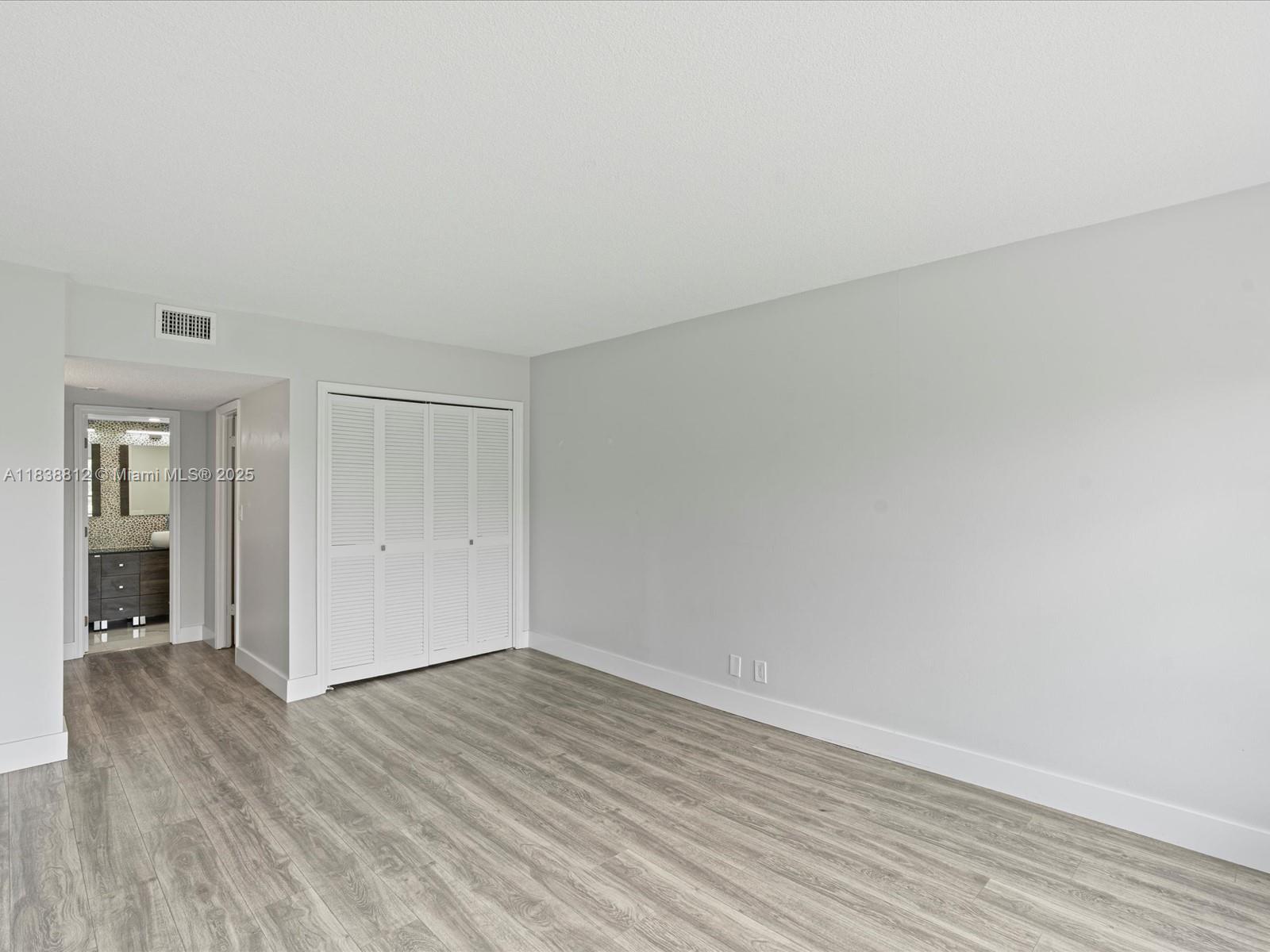 Palm Aire Pompano Beach, FL 33069 - Photo 14 of 26 wooden floor in a room