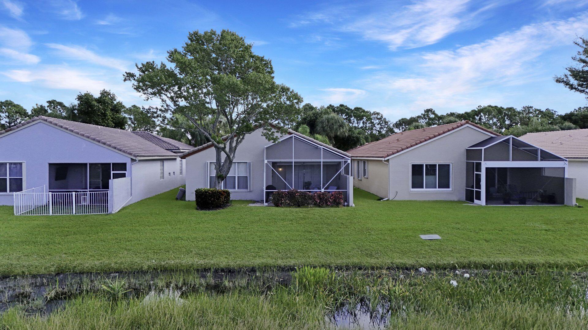 8214 Bellafiore Way Boynton Beach, FL 33472 - Photo 23 of 35 a house view with a garden space