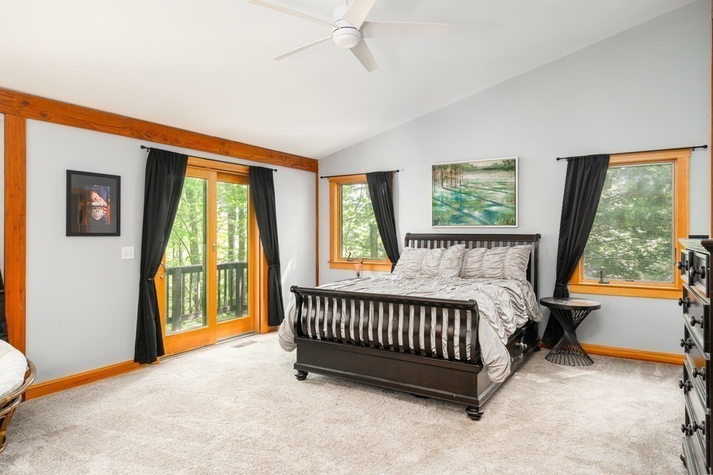 56 Southampton Road Westhampton, MA 01027 - Photo 22 of 42 a bed sitting in a bedroom next to a window