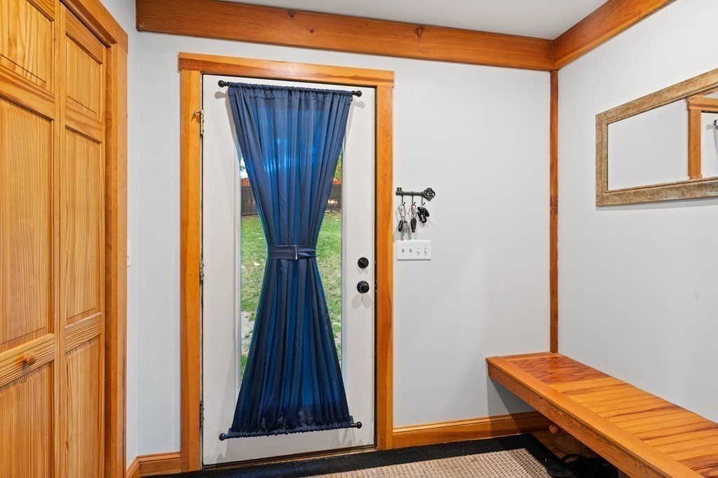 56 Southampton Road Westhampton, MA 01027 - Photo 6 of 42 a view of a hallway with wooden floor and stairs