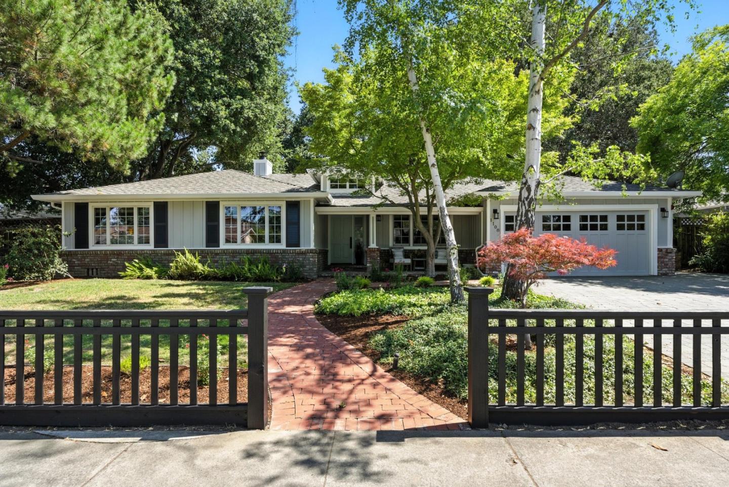 1108 Covington Road Los Altos, CA 94024 - Photo 1 of 1 a front view of a house with fountain and porch