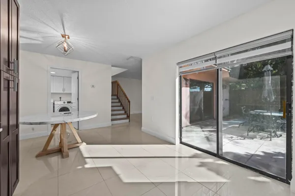 a view of a living room and bathroom