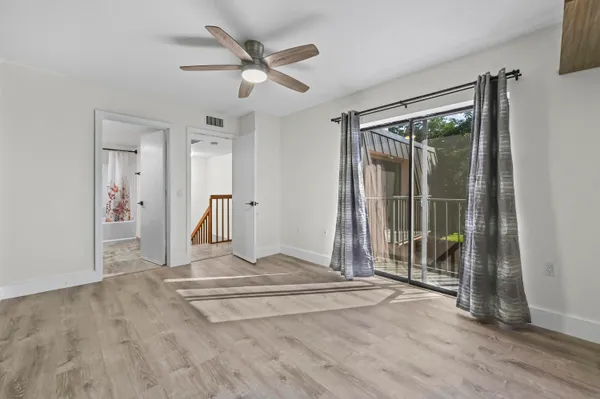 a view of entryway with wooden floor