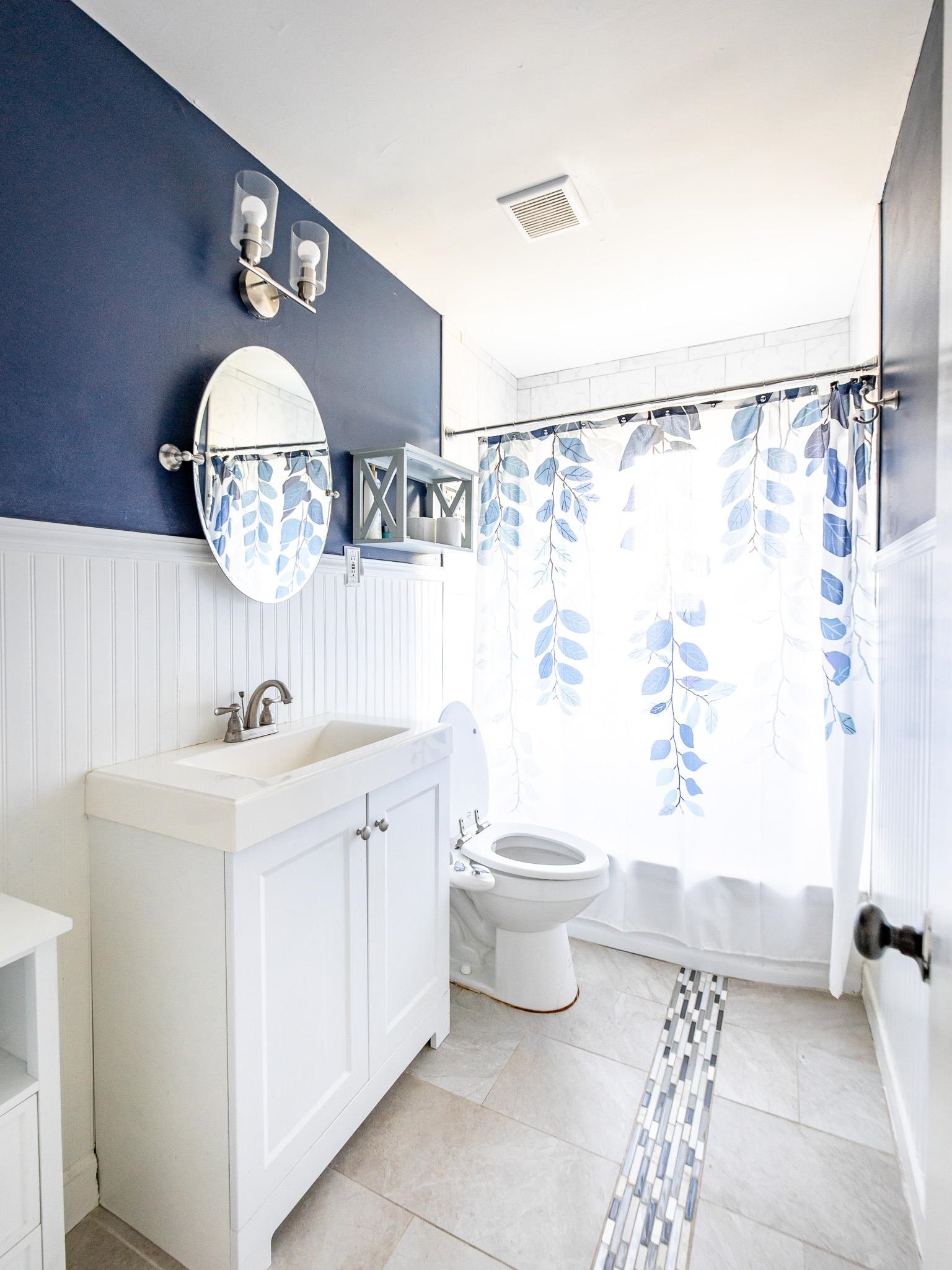4801 Sea Isle Road Memphis, TN 38117 - Photo 11 of 18 a bathroom with a sink a toilet and shower