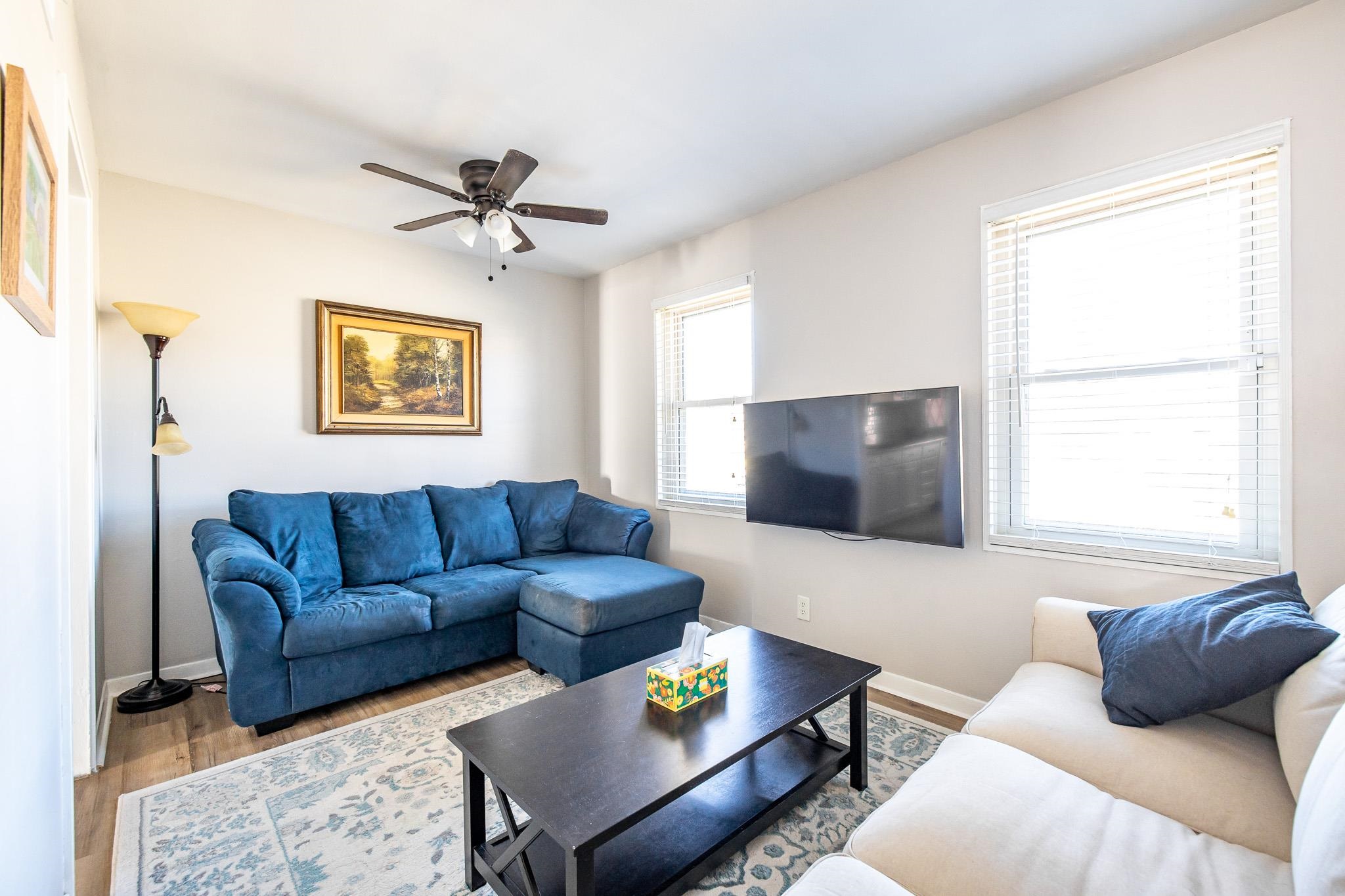 4801 Sea Isle Road Memphis, TN 38117 - Photo 3 of 18 a living room with furniture and a flat screen tv