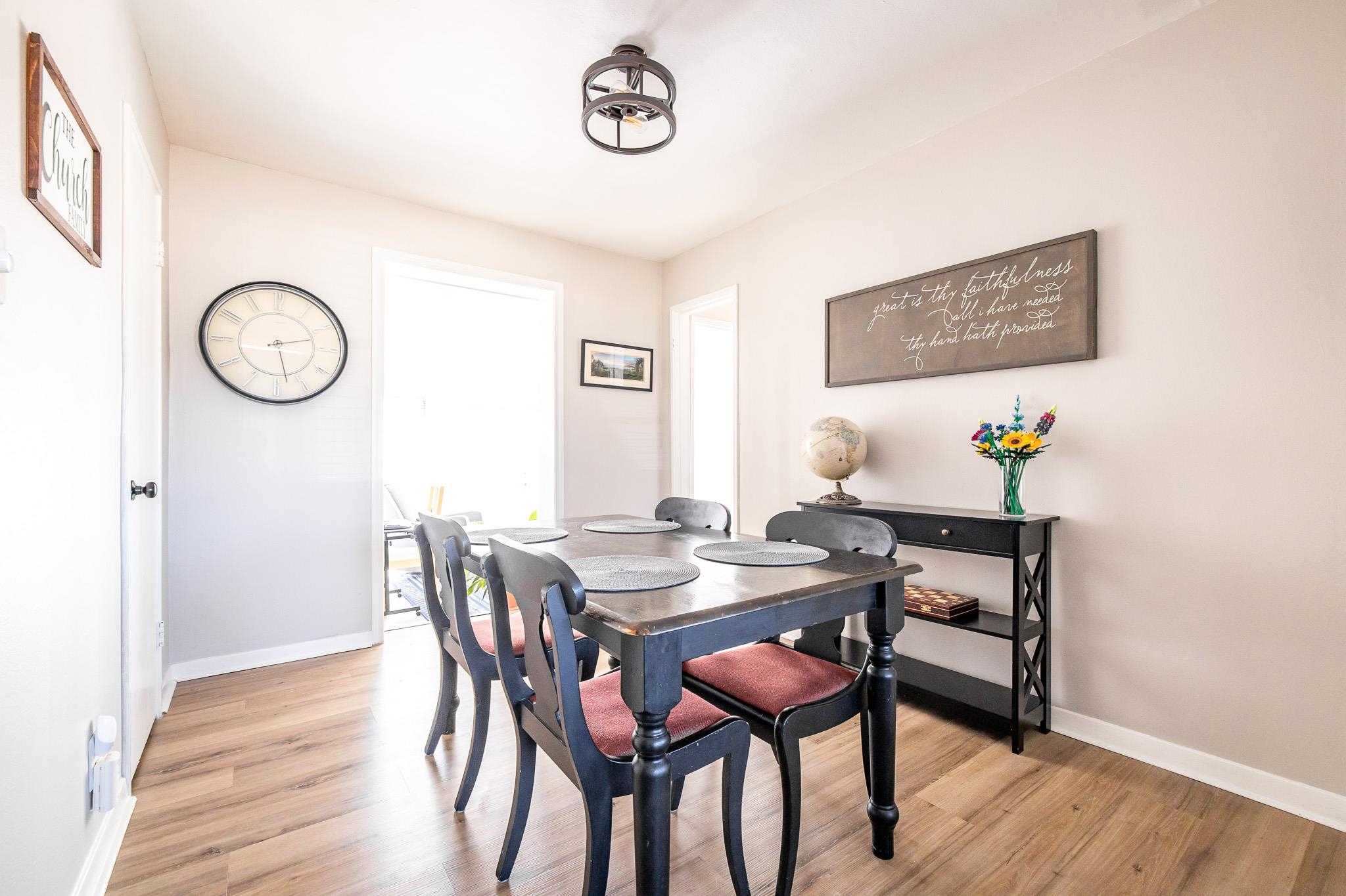 4801 Sea Isle Road Memphis, TN 38117 - Photo 6 of 18 a view of a dining room with furniture and wooden floor
