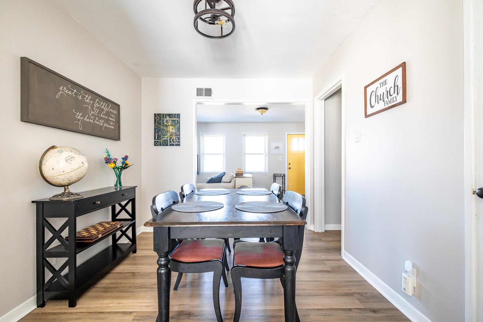 4801 Sea Isle Road Memphis, TN 38117 - Photo 7 of 18 a view of a dining room with furniture window and wooden floor