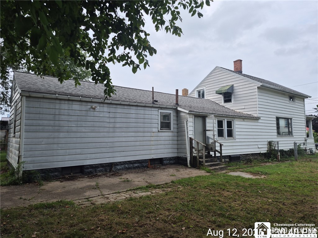 67 Ruggles Street Dunkirk, NY 14048 - Photo 3 of 22 Side yard view