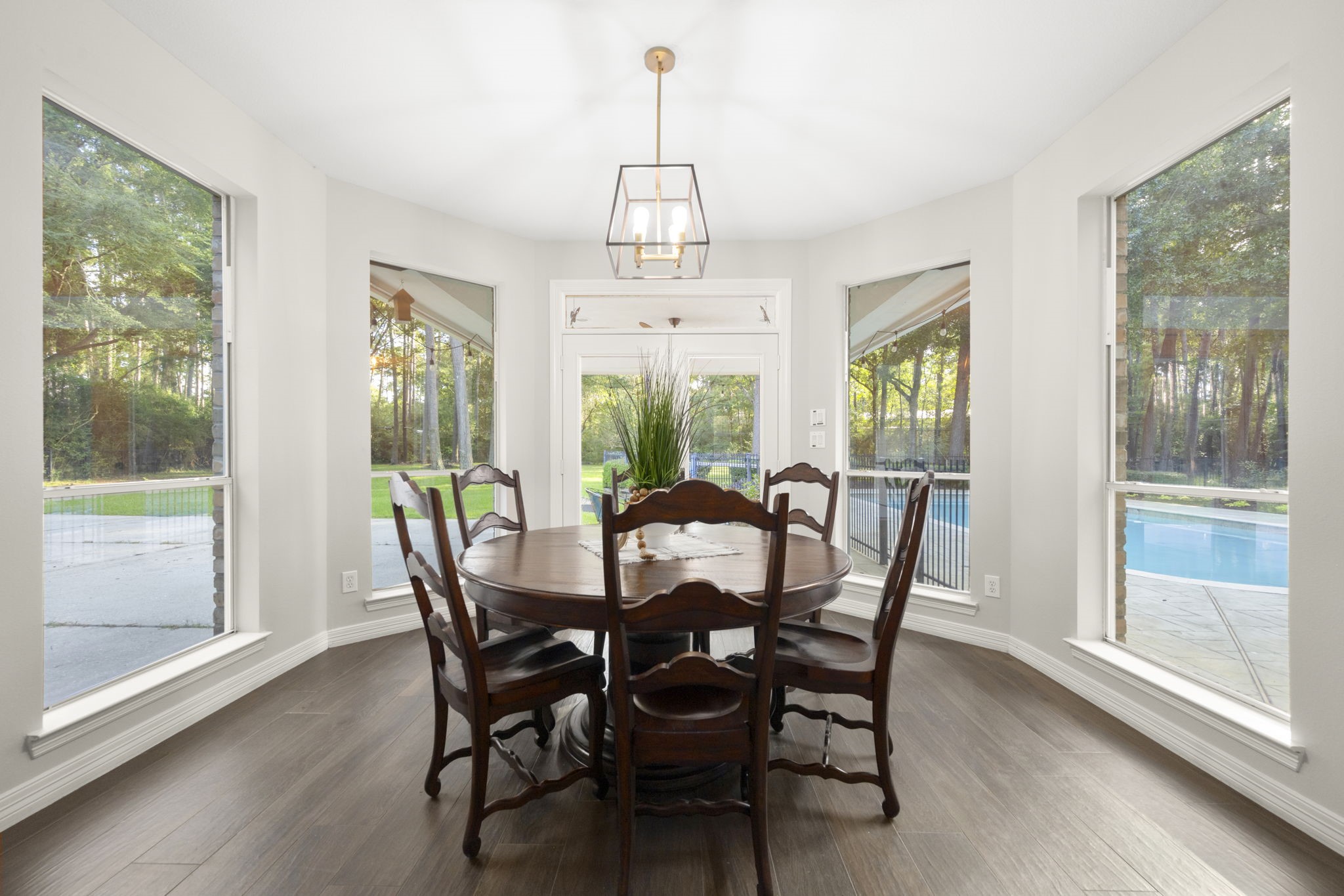 2326 Timbergreen Circle Magnolia, TX 77355 - Photo 10 of 43 a view of a dining room with furniture window and wooden floor