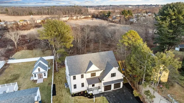 a view of residential houses with outdoor space