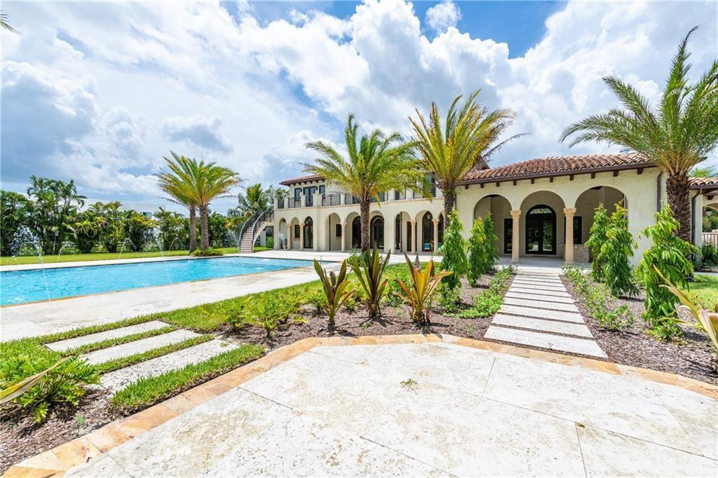 5850 Hancock Road Southwest Ranches, FL 33330 - Photo 14 of 76 BACK OF THE HOUSE AND POOL