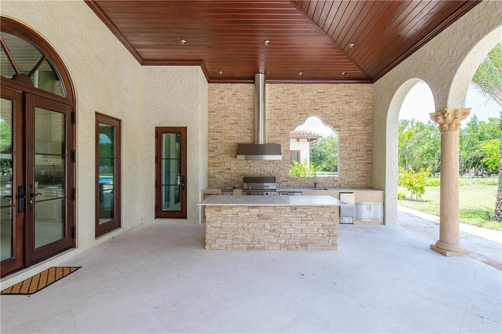 5850 Hancock Road Southwest Ranches, FL 33330 - Photo 61 of 76 SUMMER KITCHEN WITH ISLAND
