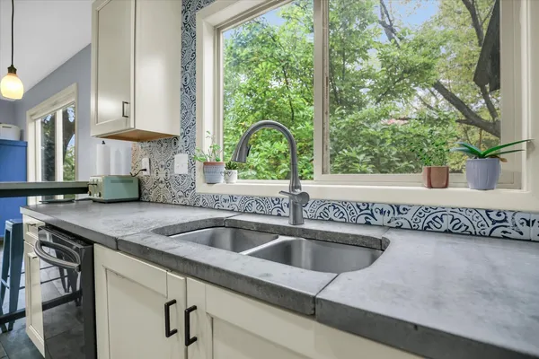 a bed room with a bed and furniture