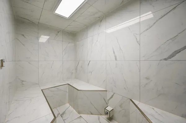 a picture of a bench in a room