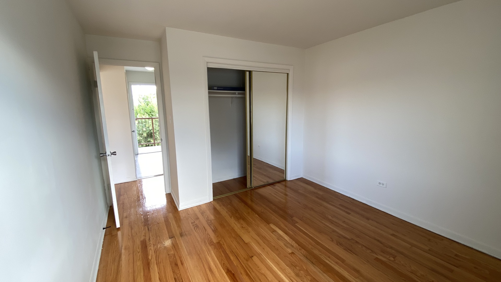 605 North Wolf Road, Unit D11 Hillside, IL 60162 - Photo 8 of 10 a view of a room with wooden floor and a window