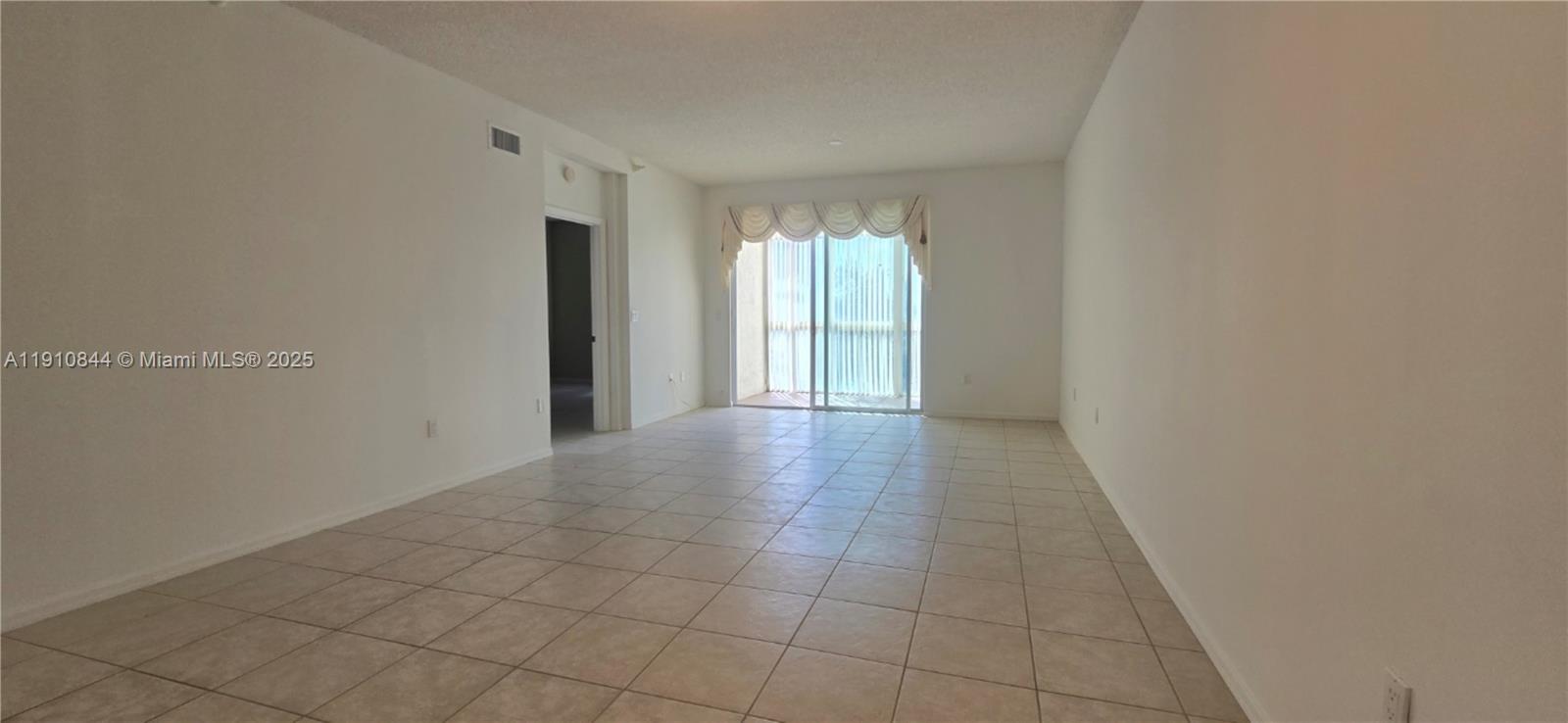 7775 Southampton Terrace, Unit 305 Tamarac, FL 33321 - Photo 15 of 39 a view of hallway with windows