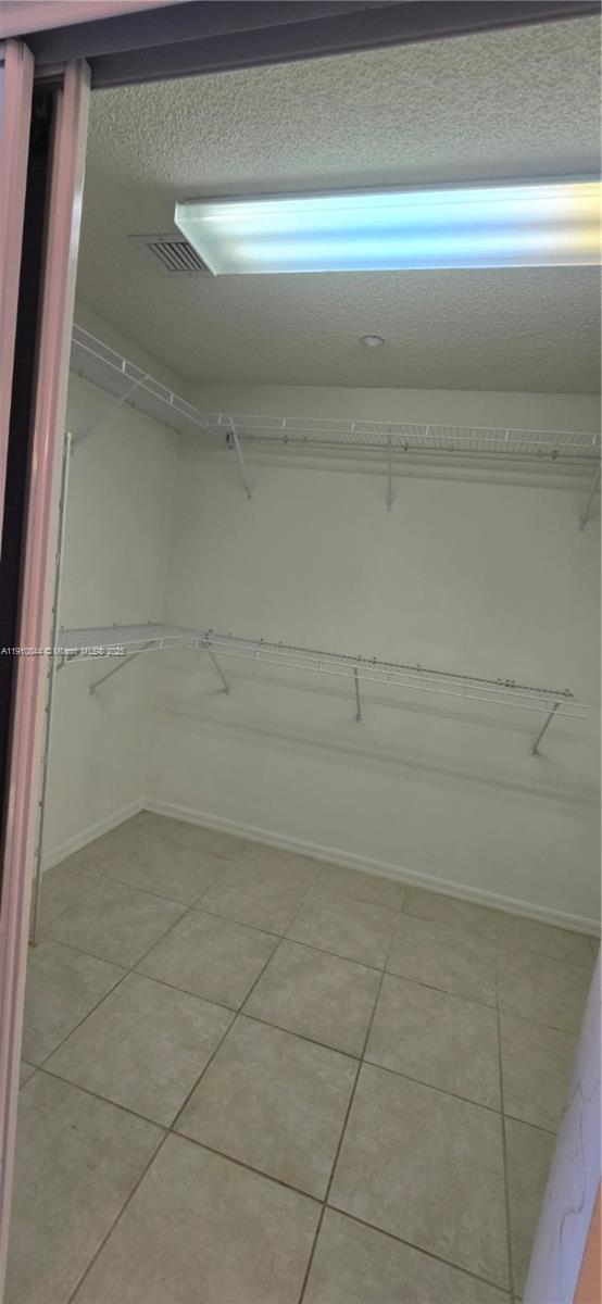 7775 Southampton Terrace, Unit 305 Tamarac, FL 33321 - Photo 23 of 39 a view of a closet