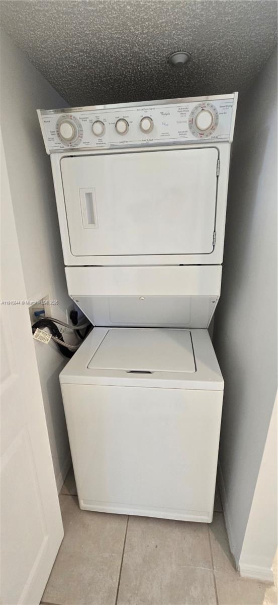 7775 Southampton Terrace, Unit 305 Tamarac, FL 33321 - Photo 28 of 39 a utility room with dryer and washer