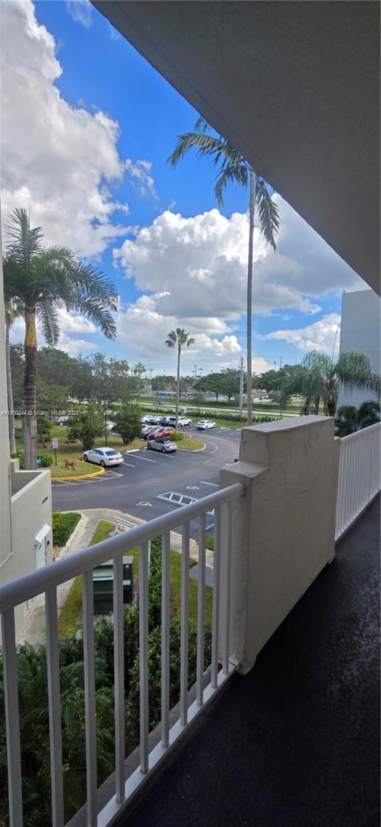 7775 Southampton Terrace, Unit 305 Tamarac, FL 33321 - Photo 32 of 39 a view of a building from a balcony