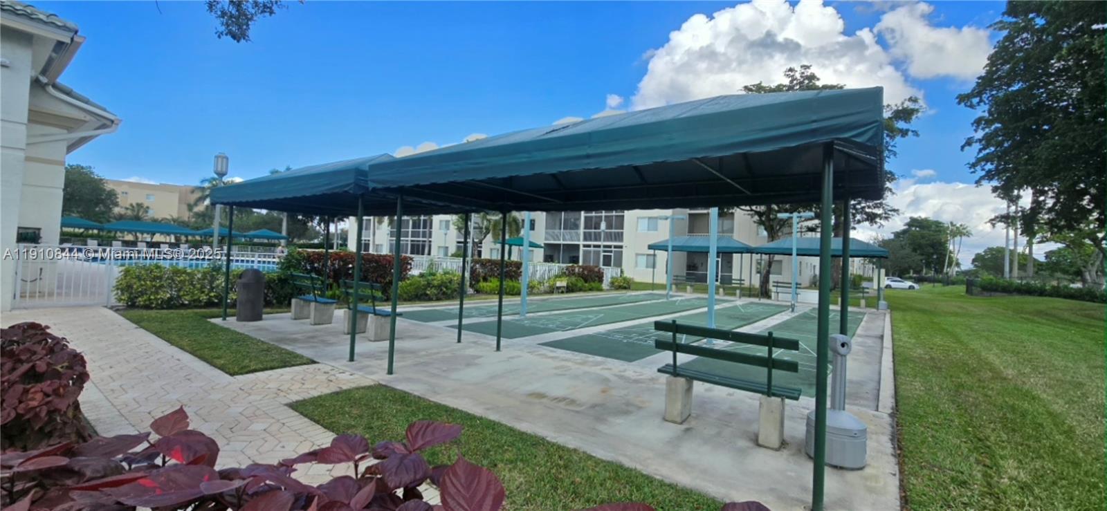 7775 Southampton Terrace, Unit 305 Tamarac, FL 33321 - Photo 35 of 39 a view of yard with patio