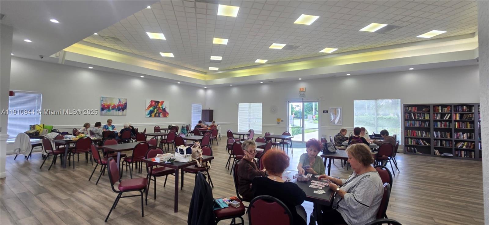 7775 Southampton Terrace, Unit 305 Tamarac, FL 33321 - Photo 37 of 39 a large room with lots of furniture and lots of wooden furniture