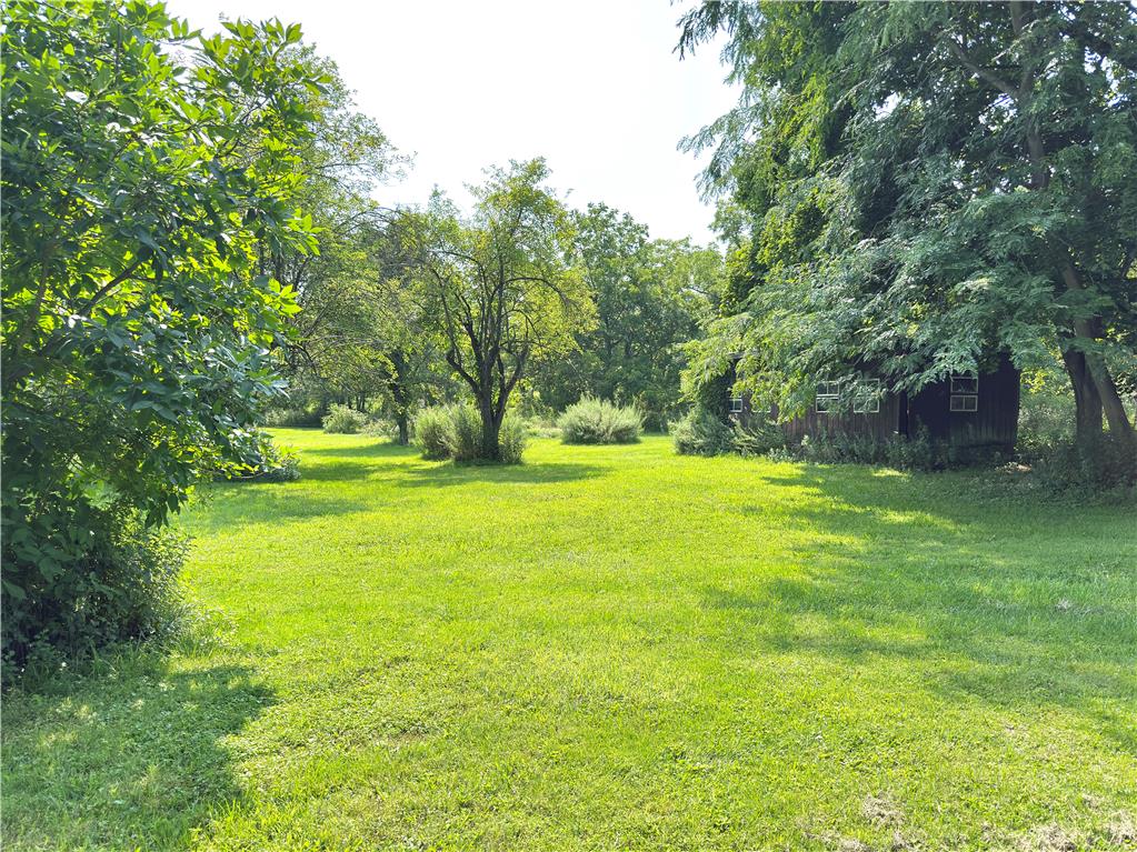 4550 Vera Cruz Road Center Valley, PA 18034 - Photo 15 of 43 Mature trees frame a sprawling grassy lawn offering plenty of open outdoor space.