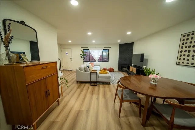 a living room with furniture and a table