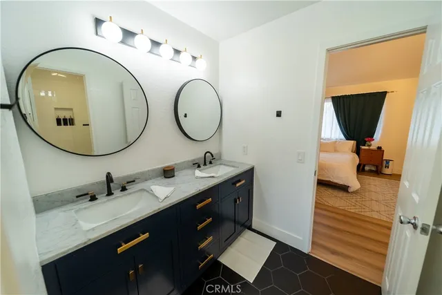 a bathroom with a sink and a mirror