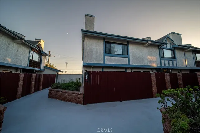 a house view with a garden space