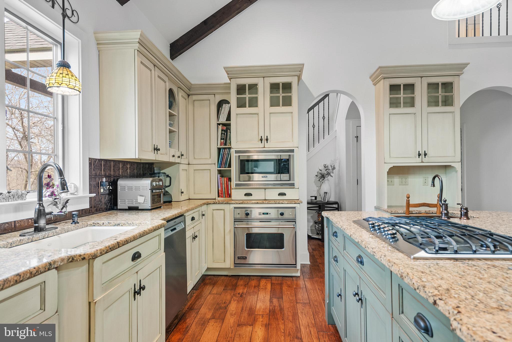 97 Wilson Road Christiana, PA 17509 - Photo 15 of 58 a kitchen with stainless steel appliances granite countertop a stove and a sink