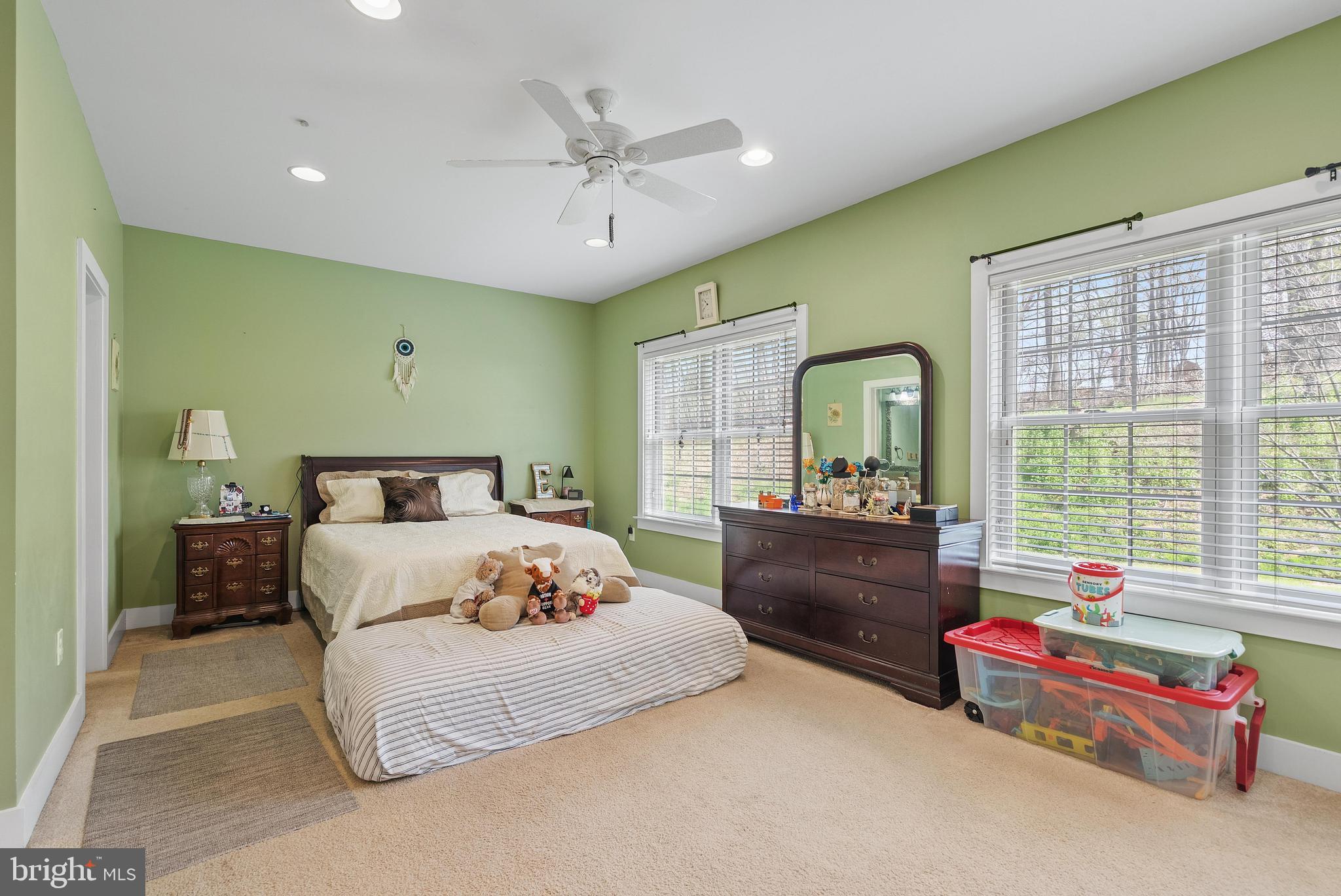 97 Wilson Road Christiana, PA 17509 - Photo 30 of 58 a bedroom with a bed and a chandelier