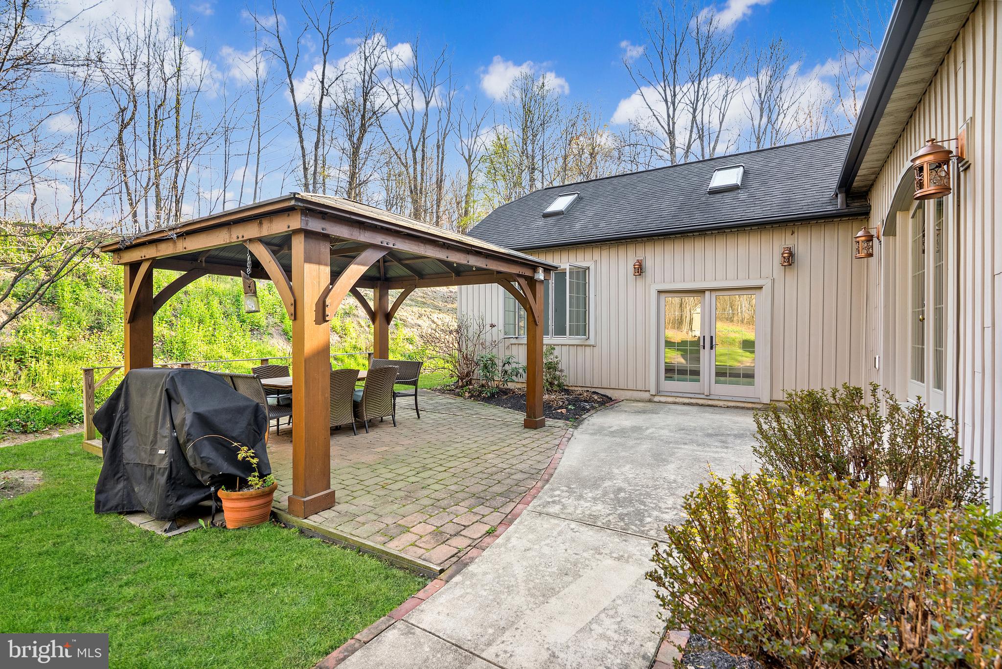 97 Wilson Road Christiana, PA 17509 - Photo 50 of 58 a view of an chair and table in the patio