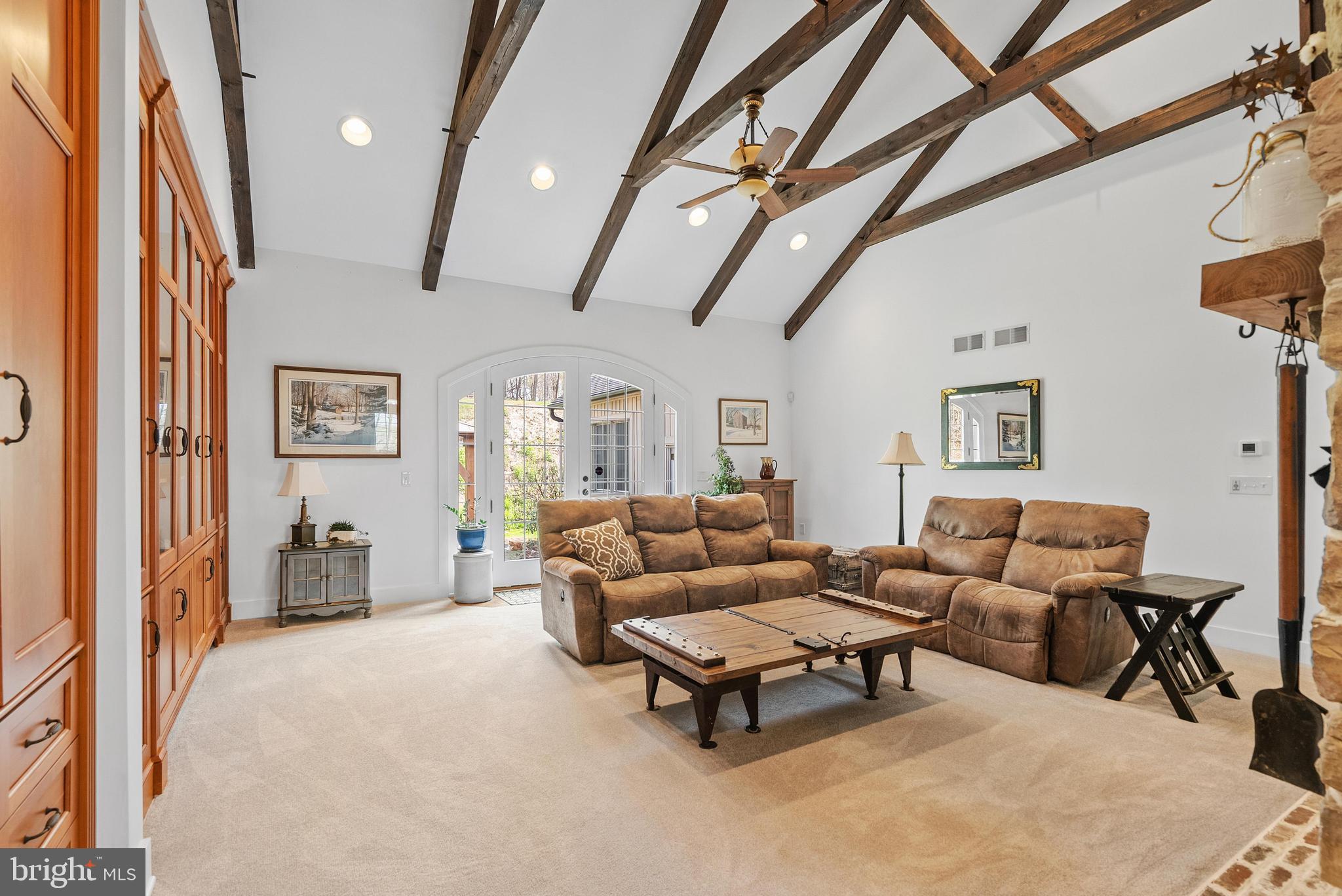 97 Wilson Road Christiana, PA 17509 - Photo 6 of 58 a living room with furniture and a chandelier