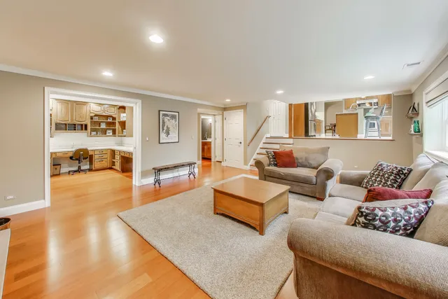 a bathroom with a sink vanity mirror and toilet