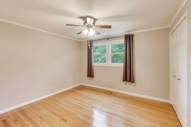 a bathroom with a toilet a sink and shower