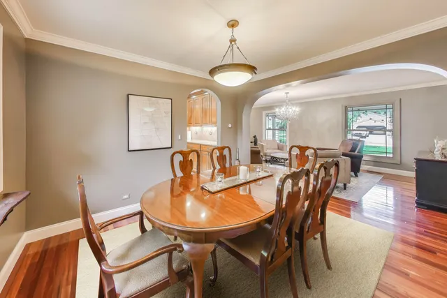 a kitchen that has a sink a stove and a refrigerator