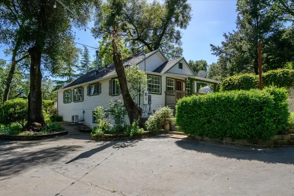 front view of a house with a street