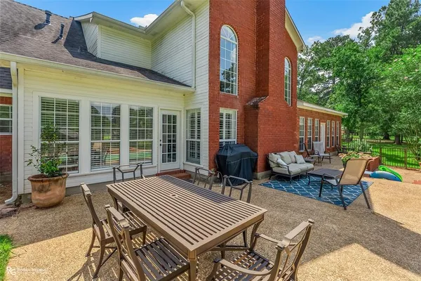 a backyard of a house with seating space