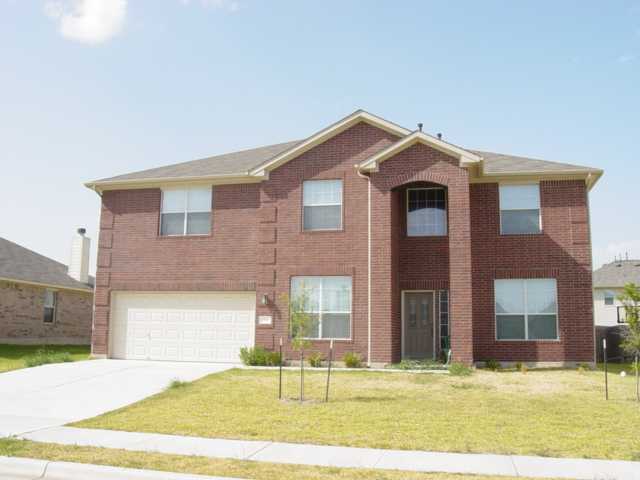 916 Rochester Castle Way Pflugerville, TX 78660 - Photo 1 of 1 a front view of a house with a yard