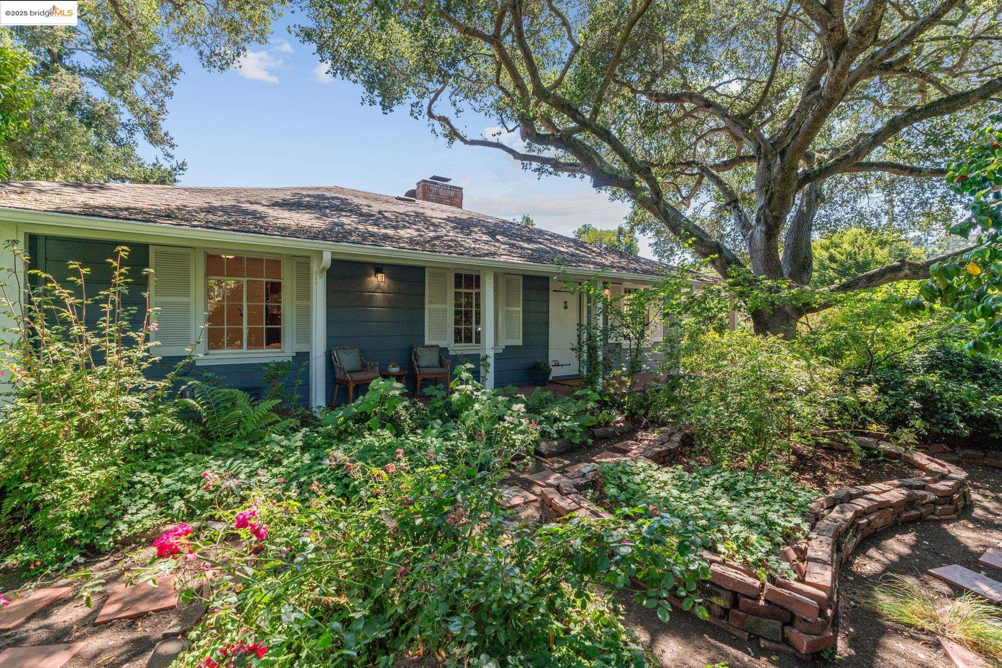 5550 Snake Road Oakland, CA 94611 - Photo 1 of 1 View of front of property featuring a chimney