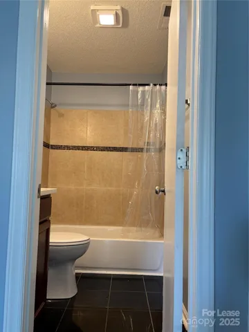 a bathroom with a sink and a shower