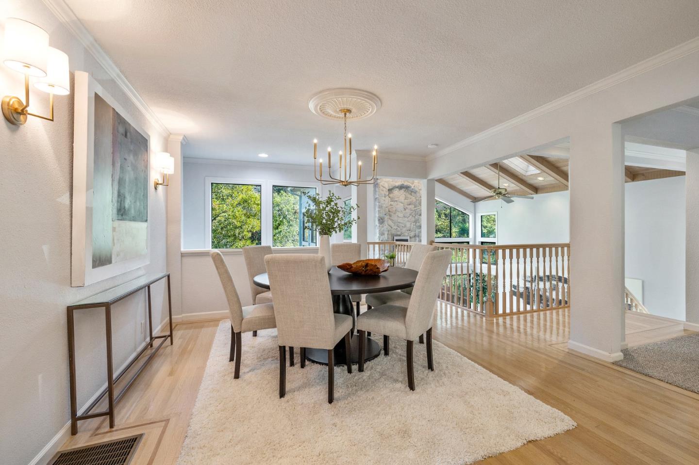 37 Vía Canon Millbrae, CA 94030 - Photo 20 of 69 a dining room with furniture a chandelier and wooden floor