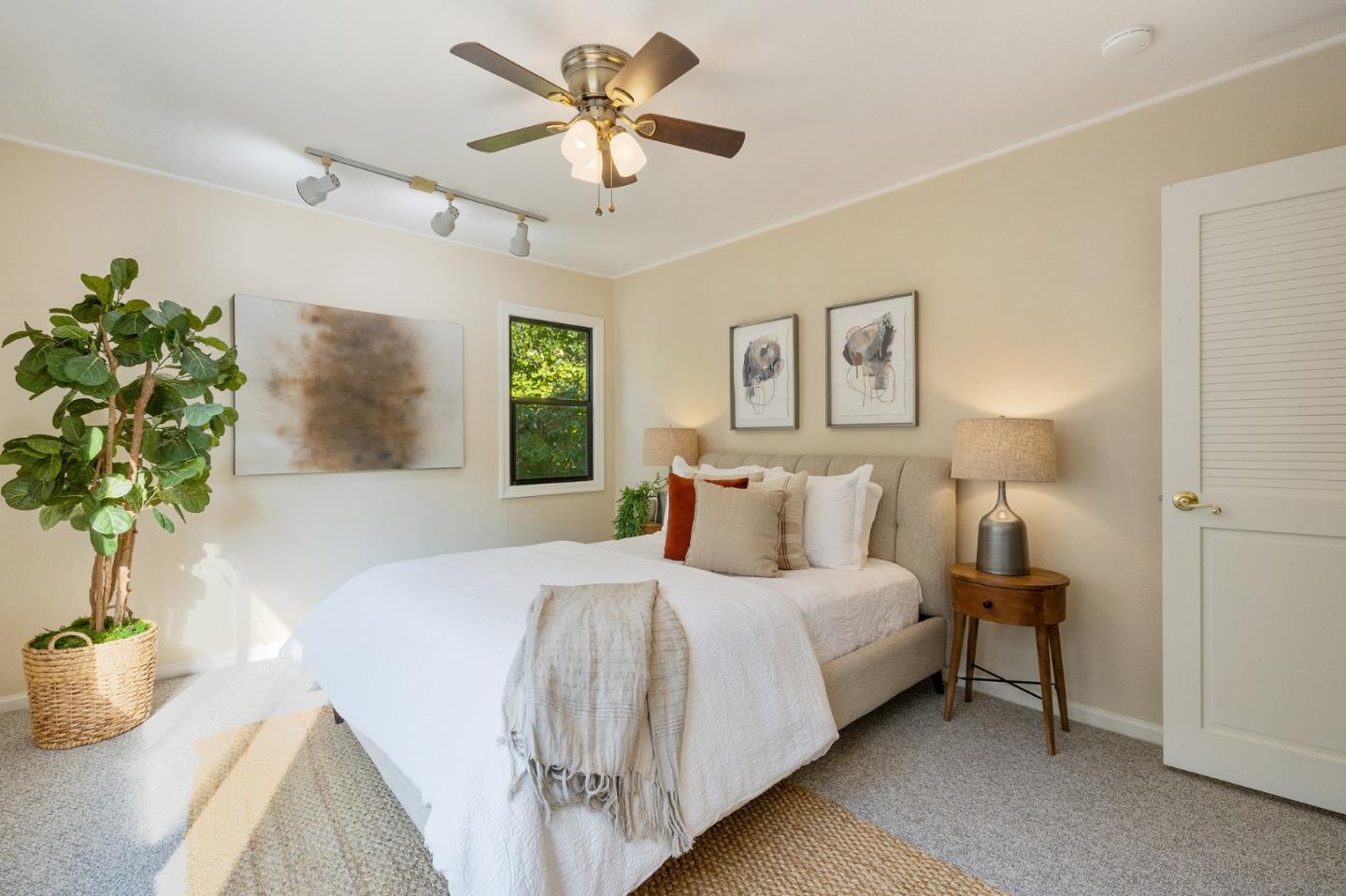 37 Vía Canon Millbrae, CA 94030 - Photo 47 of 69 a bedroom with a large bed and a potted plant