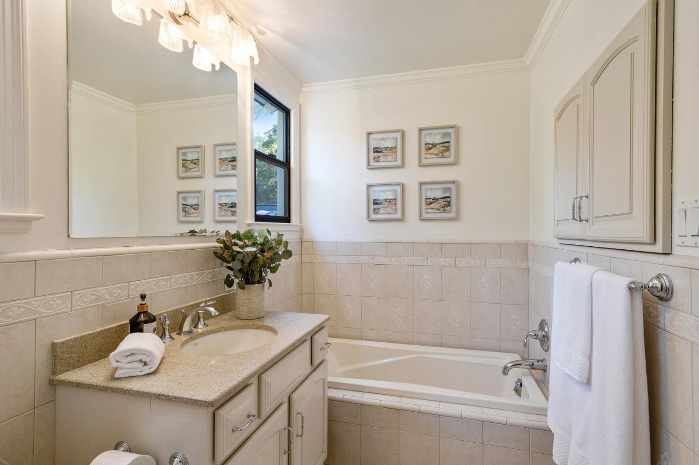 37 Vía Canon Millbrae, CA 94030 - Photo 49 of 69 a bathroom with a sink vanity tub and a mirror