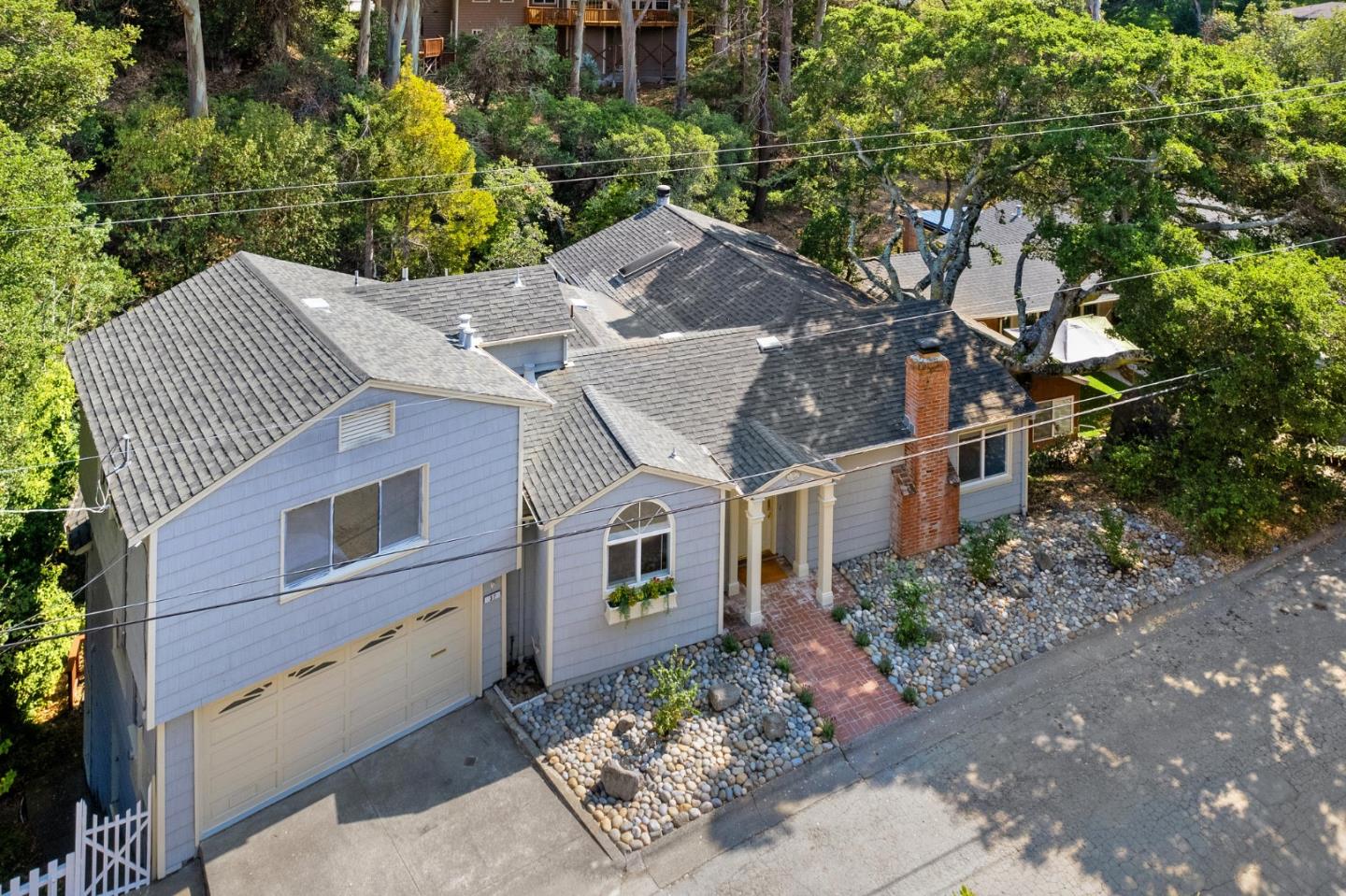 37 Vía Canon Millbrae, CA 94030 - Photo 55 of 69 a front view of a house with a garden