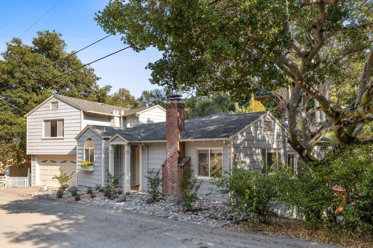 37 Vía Canon Millbrae, CA 94030 - Photo 56 of 69 a front view of a house with a yard