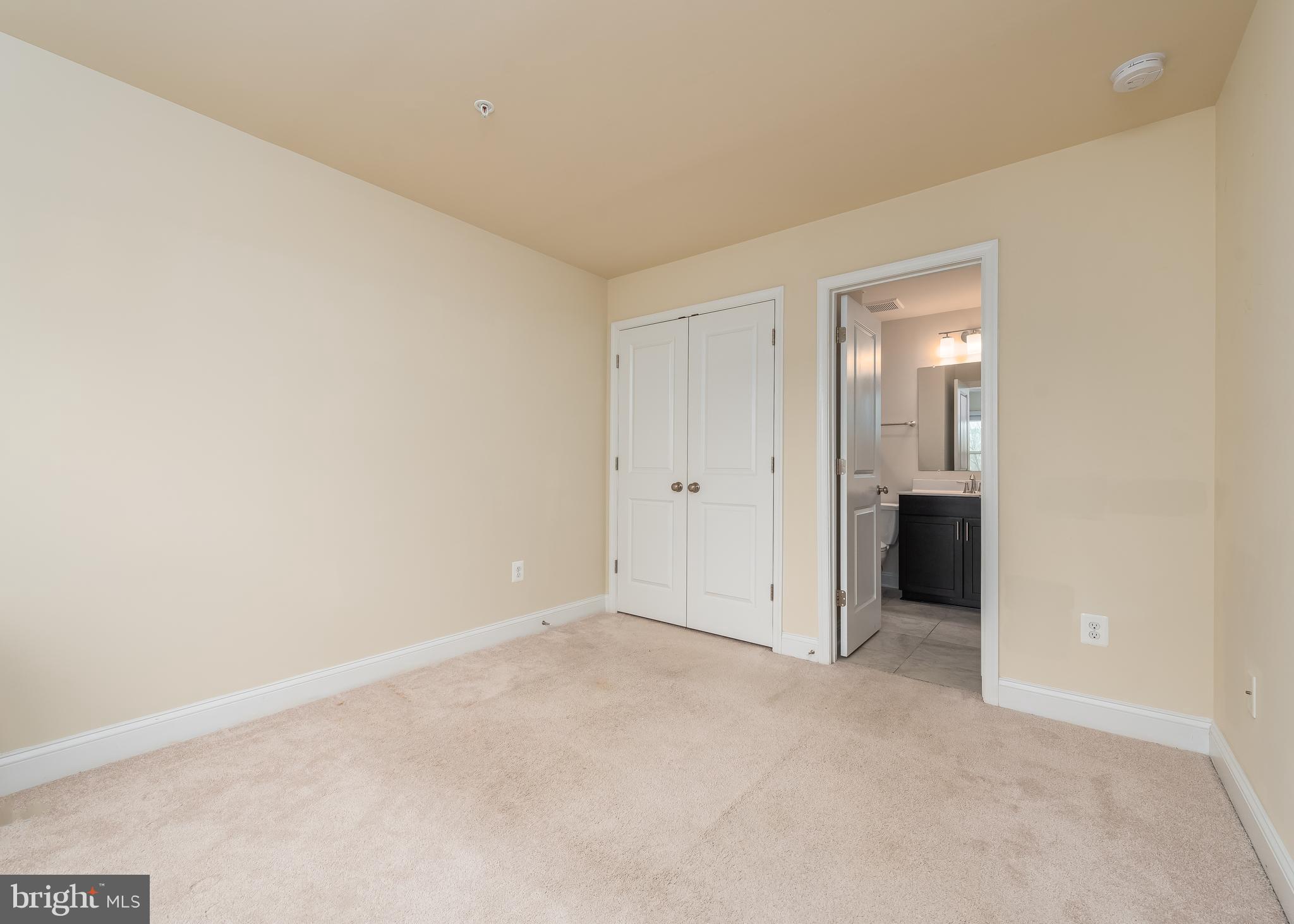 7038 Rackham Way Hanover, MD 21076 - Photo 21 of 30 an empty room with an entryway