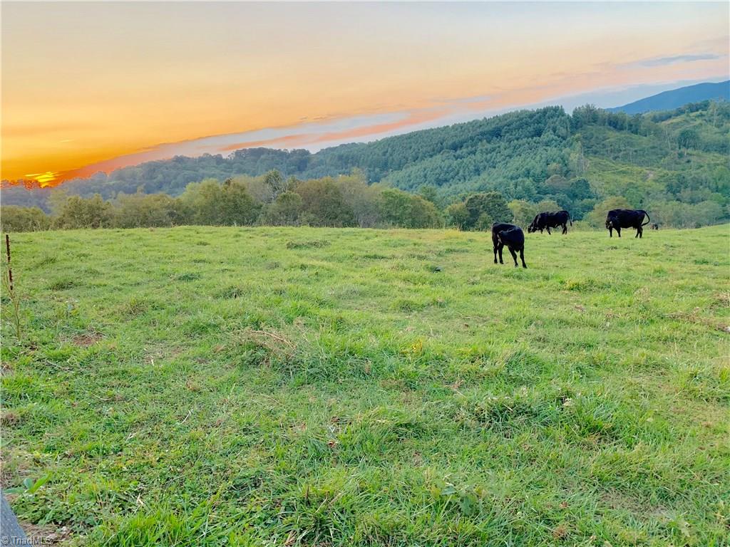 496 Osborne Memorial Road Sparta, NC 28675 - Photo 2 of 30 Sunset view from the home at 496 Osborne Memorial Road in Sparta.