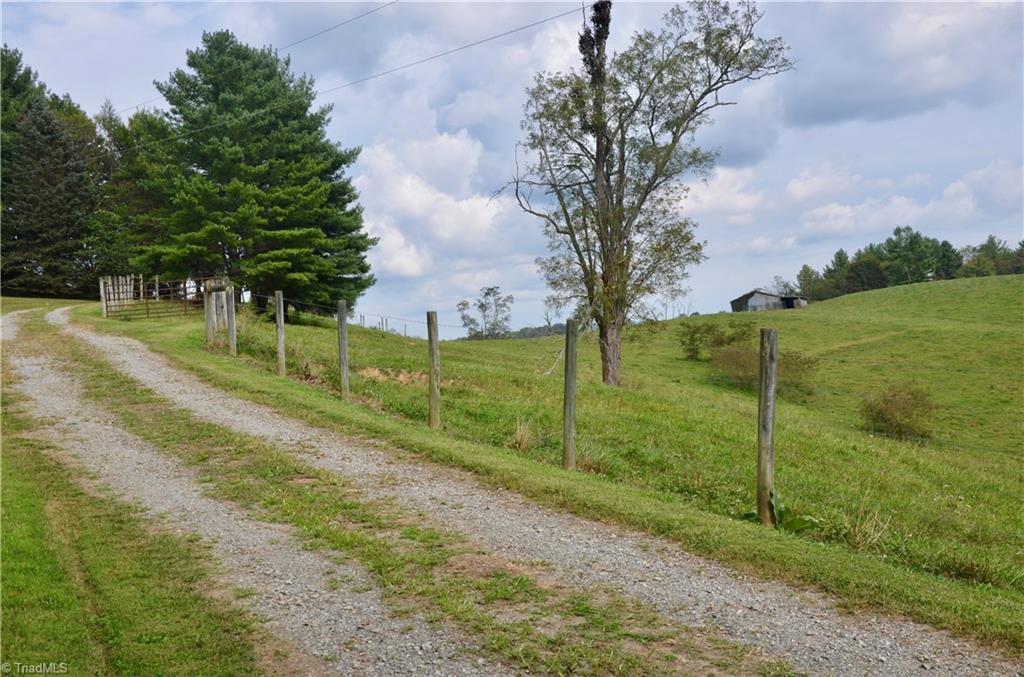 496 Osborne Memorial Road Sparta, NC 28675 - Photo 27 of 30 Easy to navigate drive to the home off of a two-lane, state maintained road.