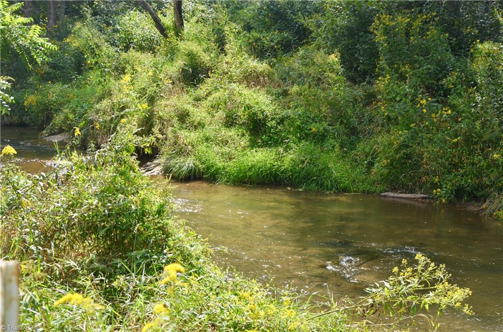 496 Osborne Memorial Road Sparta, NC 28675 - Photo 7 of 30 Elk Creek borders your property.